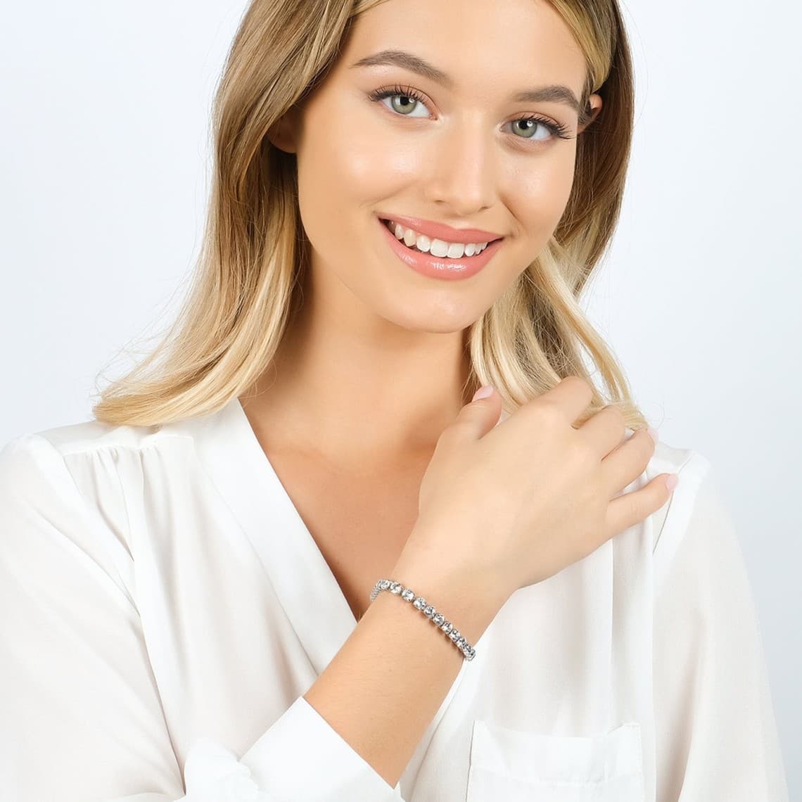 BRACCIALE TENNIS DONNA IN ACCIAIO IP GOLD CON CRISTALLI BIANCHI DA 4 MM
