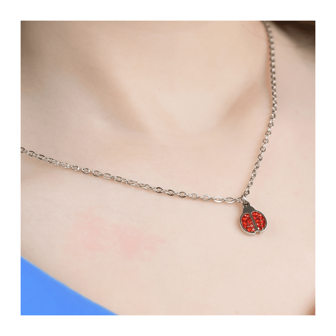 COLLANA BAMBINA IN ACCIAIO CON COCCINELLA E CRISTALLI ROSSI