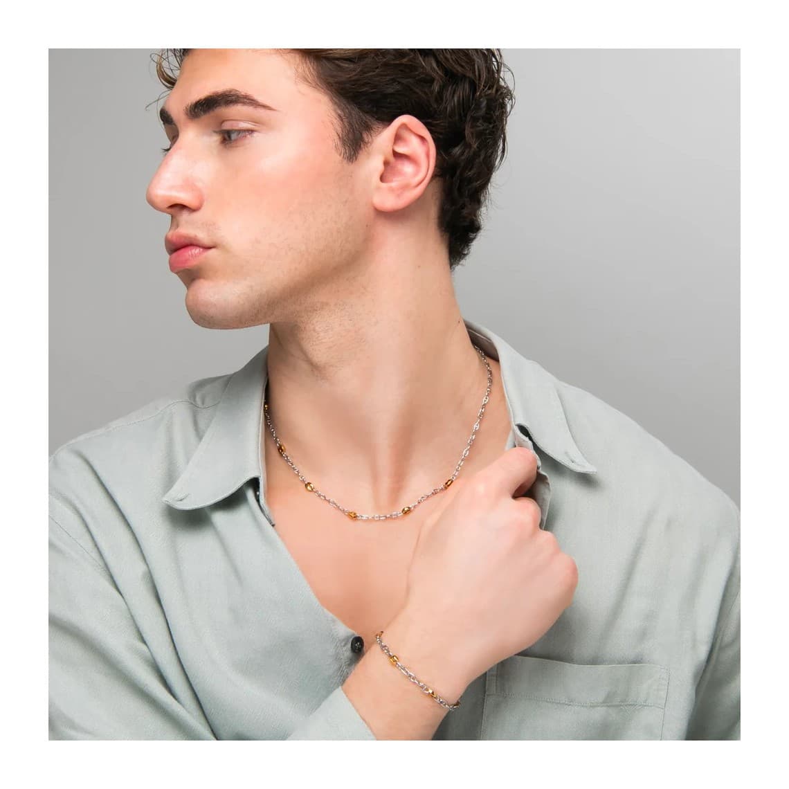 Bracciale uomo con elementi in acciaio IP gold BA1938
