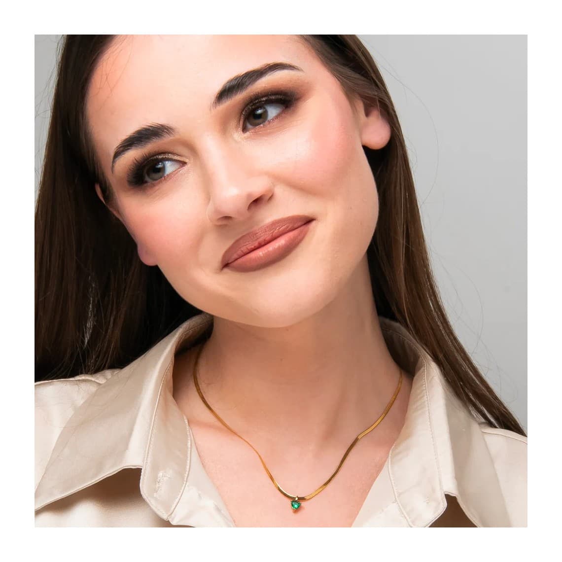 Collana donna in acciaio colore oro con zircone verde CK2257