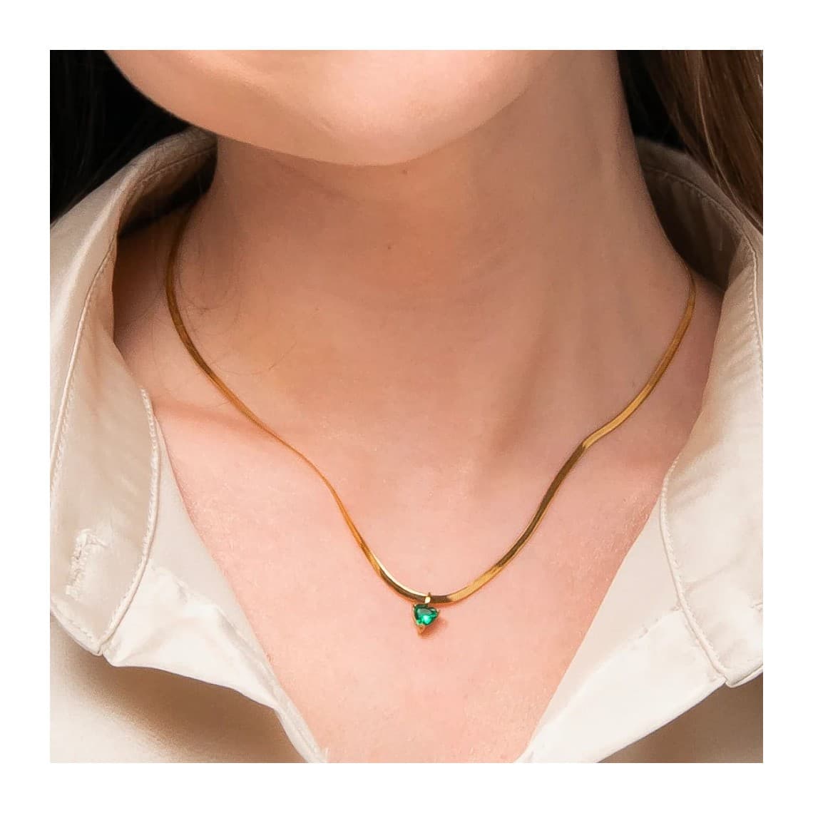 Collana donna in acciaio colore oro con zircone verde CK2257