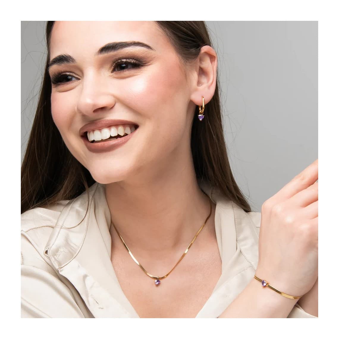 Collana donna in acciaio colore oro con zircone viola CK2256